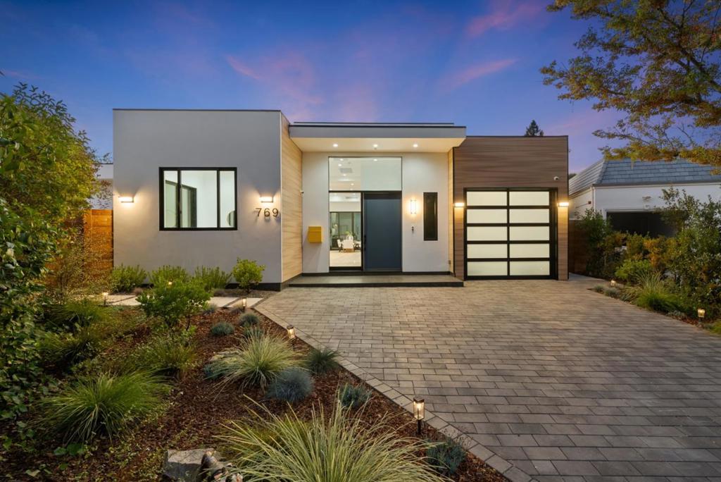 Discover a rare single-story architectural masterpiece in Palo Alto, designed with soaring 21-foot ground-to-roof elevation and 14-foot interior ceilings that define modern luxury. This 5-bedroom, 5-bath residence spares no expense, showcasing custom Thermador appliances, Engineered hardwood flooring, Anderson windows, Duravit bathroom fixtures, and a deep concrete slab foundation built for lasting quality. All bedrooms face south, welcoming natural light throughout the day, while skylights further brighten the open floor plan. The nearly 9,000 sq. ft. lot features a backyard large enough for a pickleball court, complemented by an outdoor dining patio; ideal for entertaining or relaxing in complete privacy. Tucked away on an exclusive cul-de-sac, the property offers unmatched seclusion in one of Palo Altos most sought-after neighborhoods. Built with a TPO commercial-grade roof and owned solar, this home is green-rated and move-in ready. Award-winning Palo Alto schools complete this rare opportunity to own a one-of-a-kind residence where architectural distinction meets modern convenience.