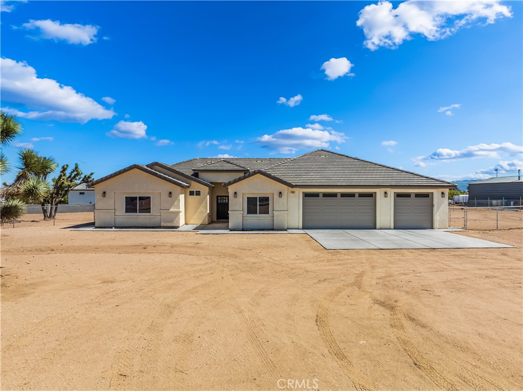 Welcome to 7453 Daisy Rd…the perfect balance of luxury, comfort, and adventure, a stunning, newly built single-story masterpiece (2023) nestled on 1.86 acres of flat, fully usable land. With just under 2,500 square feet of thoughtfully designed living space, this 4-bedroom, 3-bathroom home offers the freedom of wide-open spaces with the refinement of modern construction.
Step inside to find an open-concept floor plan drenched in natural light, where every corner feels like home. The expansive great room flows effortlessly into a gourmet kitchen, ideal for entertaining or gathering around after a day outdoors. With spacious bedrooms and three full baths, everyone has room to relax in comfort.
Wait, the outdoor space is amazing!
Whether you’re hosting unforgettable summer nights under the stars, tearing through dirt trails on your bikes, or watching the sunset dance across the surrounding mountain vistas, this land is your canvas. Flat, usable, and ready, it’s perfect for building a pool, a guest house, or simply enjoying the wide-open sky.
And for your tools, toys, and RV? You’re covered….literally. The massive 30’ x 40’ garage/workshop is fully powered and ready to handle everything from weekend projects to full-scale adventures. Park your RV, load up your gear, and hit the trails, then come home to comfort.
No compromises. No limits. Just pure potential.
Make this one-of-a-kind property your own, and start living the life you’ve been dreaming of.