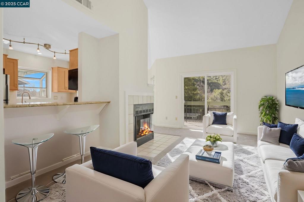 Tucked away in one of Pleasanton's most convenient locations, this pristine upper level condo offers gorgeous views! With one of the best locations in the complex, this unit has a bright and open floor plan with vaulted ceilings for lots of natural light. It features new carpet, fresh paint, new window treatments, newer windows and newer HVAC. The remodeled kitchen has pull out shelves, self closing drawers, granite countertops, a breakfast bar, eat-in dining and GE appliances. Remodeled bathrooms, In-unit laundry closet with washer & dryer included, ample storage and two covered balconies. Detached 1 car garage, plus driveway parking space, ample visitor parking spaces and more! HOA amenities include 2 pools/hot tubs, basketball court, beach volleyball, tennis court, club house w/gym, sauna, water, heated water and more! Minutes away from freeway entrances - 580 & 680, BART stations, shops, restaurants.