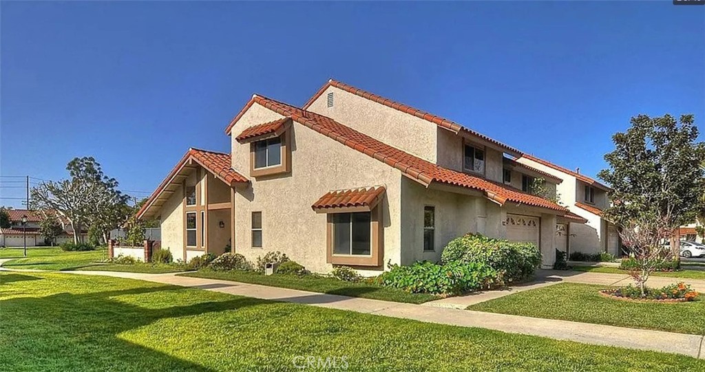 Exceptional 3 bedrooms, 2 full bathrooms, and a unique loft area serving as an additional bedroom or lounge area with a spacious crawlspace offering an additional storage option!
This remarkable La Cuesta townhome occupies a corner position, graced with the community's green surroundings. Step into the backyard, adorned with a flourishing assortment of organic plants and trees, including a medley of lemon, orange, plum/peach/apricot combination, pomegranate, apple, mango, peach, and grape vines, all for tenant's pleasure.
Inside vaulted ceilings create an airy and spacious ambiance, while fresh vinyl flooring and newly painted interiors exude contemporary elegance. An electric fireplace with remote control adds both warmth and convenience, while surround sound speakers enhance the movie-watching experience. The home is equipped with a new heater for added comfort.
The well-appointed kitchen includes the convenience of a refrigerator, dishwasher, stove, and microwave. The smart garage, accommodating two cars, also houses a washer and dryer for your personal use. Open and close the garage from your phone or park in the 2 car driveway outside of the garage.
Each bedroom and common area is equipped with brand new Google Nest smoke detector/carbon monoxide combos. Furthermore, two Blink security cameras are positioned at both entrances, ready to connect to your phone for enhanced security measures.
Home is also in the free golf cart pickup area of Downtown Huntington Beach. Immerse yourself in the vibrant coastal lifestyle as you conveniently navigate the charming streets and explore the numerous attractions. Whether it's strolling along the beach, indulging in local dining in Pacific City, or simply reveling in the lively ambiance, the accessibility to free golf cart pickup adds an extra layer of convenience and enjoyment to your daily adventures.