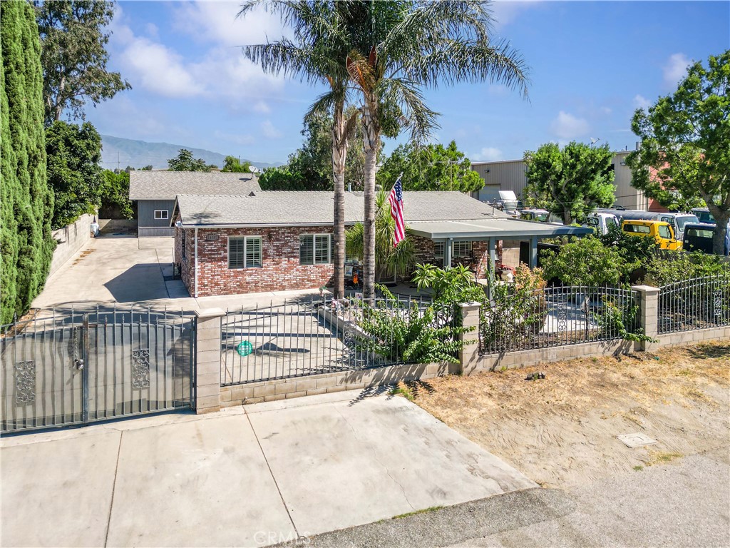 Welcome to this unique and versatile home with an ADU in the heart of Fontana! The main residence offers 4 spacious bedrooms and 2 bathrooms, thoughtfully updated with modern finishes and move-in ready appeal. Adding incredible value, the property also features a fully equipped 2-bedroom, 1-bathroom ADU complete with its own kitchen—perfect for multi-generational living, guest accommodations, or rental income potential.
Sitting on a huge lot with secure gated entry, this property provides ample outdoor space with mature fruit trees, ideal for relaxing, entertaining, or enjoying your own mini orchard. There’s also plenty of room for additional parking, storage, or future expansion.
With its unique dual-living setup, modern updates, and rare combination of features, this property is truly one-of-a-kind and a fantastic opportunity for homeowners and investors alike.
Don’t miss your chance to own this exceptional property—schedule your private showing today!