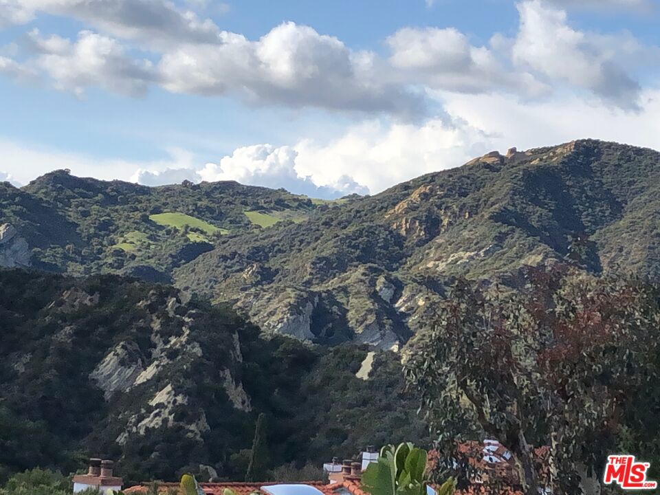 Photo of 17290 Avenida De La Herradura, Pacific Palisades, CA 90272 (MLS # 26997837)
