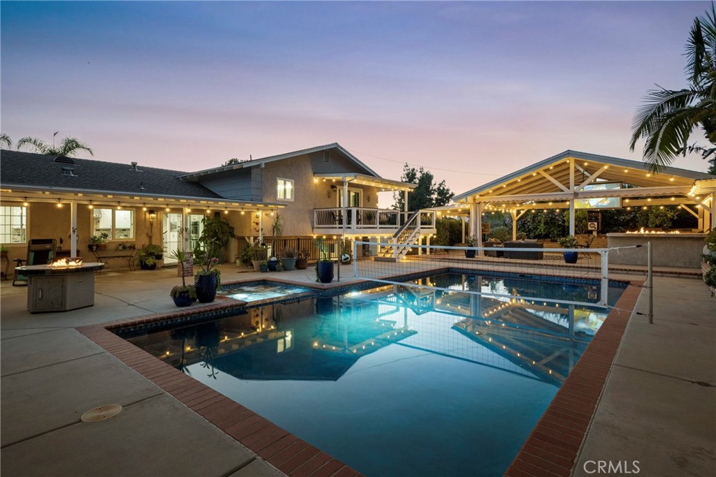 Welcome to Your Private Oasis in Fallbrook! Step into resort-style living with this beautifully renovated 4-bedroom, 3-bathroom home designed for comfort, entertaining, and unforgettable memories. Nestled on a spacious lot in the heart of Fallbrook, this property boasts an oversized entertainer’s dream yard featuring a large, sparkling saltwater pool, multiple covered patios, and ambient outdoor lighting that creates a lush, Hawaiian-inspired paradise every evening. Inside, you’ll find a completely updated interior with all-new appliances, fresh white cabinetry, newly remodeled bathrooms, and a sleek tankless water heater for modern efficiency. The floorplan offers flexibility with a large downstairs den, a formal living room, and a spacious primary suite with a private balcony—the perfect spot for morning coffee or sunset views.
Additional highlights include:
•Double RV parking with full RV hookups and 50-amp service
•A one-year-old roof and central vacuum system
•Surround sound and stereo system in the outdoor and indoor entertainment space
•Five separate patios offering endless options for indoor-outdoor living and hosting
•Lush landscaping and mood lighting that surrounds the entire exterior
This home checks every box—style, functionality, and that elusive wow factor. Whether you’re hosting weekend barbecues or enjoying peaceful nights under the stars, this Fallbrook gem is where memories are made. Schedule your private tour today and experience the magic for yourself!