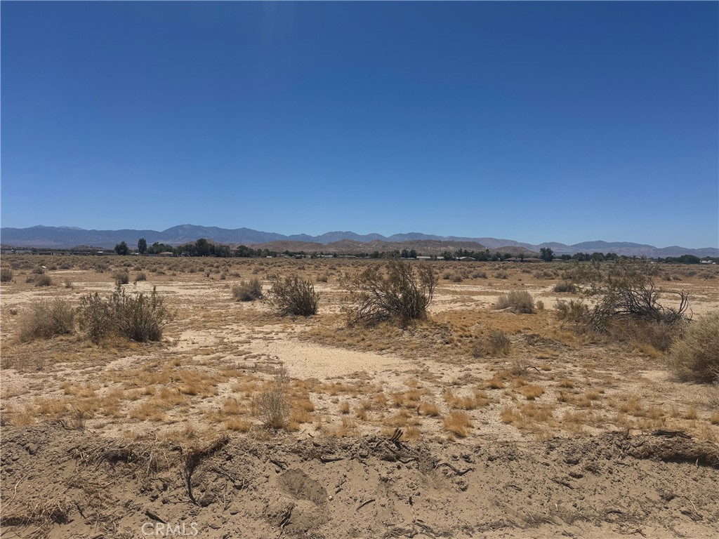 4.77 Acres with Spectacular Butte Views & Legal Paved Access – Lake Los Angeles
Don’t miss this rare opportunity to own a spacious 4.77-acre lot in Lake Los Angeles! Enjoy breathtaking views of the buttes, legal paved road access, and a peaceful rural setting—just 10 minutes from town. Whether you're looking to build your dream home, invest in land, or simply escape the city, this property offers endless potential.
Conveniently located near gas, groceries, dining, a local museum, and a community park, you'll have the best of both worlds: tranquility and accessibility. Electricity is nearby, making development even easier.
This is an ideal property for recreation, future development, or a long-term investment. Secure your slice of the future today—opportunities like this don’t last!