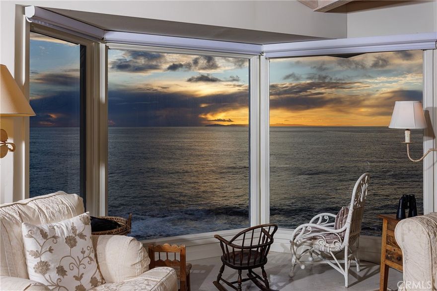 Directly above one of the most photographed locations in Laguna Beach, this stunning three-bedroom, three-bath home is the epitome of ocean-front living. Peering directly down from the private deck into the "Mermaid Pool" (an actual ocean-filled saltwater pool), the experience almost seems surreal. Just to the north is another famous landmark, the "Pirate Tower," making this section of beach the preferred destination for posters seeking followers on their TikTok and Instagram feeds. This classic 1940s home is a throwback to a gentler more comfortable time when the sounds of the crystal clear waves crashing on the rocks below your deck, and watching the sun dip behind Catalina Island were all the entertainment anyone required. This special place offers a peaceful and tranquil retreat that will cleanse one's soul from the daily pressures of day-to-day life. Be one of the fortunate few to take advantage of this truly unique experience.