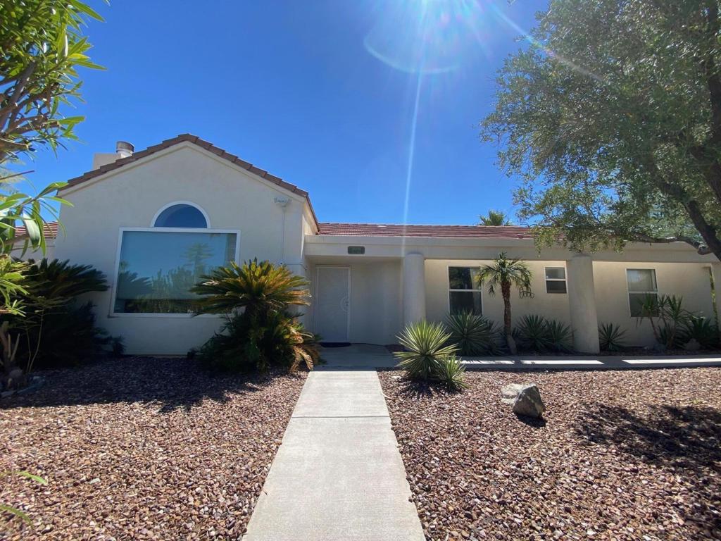 Private 3BR/2BA corner-lot home with 1,900+ sf on 8,200+ sf lot. Open floor plan with vaulted ceilings, travertine floors, large windows, and partial mountain/valley views. Kitchen with oversized island opens to flexible-use room and patio. Primary suite with walk-in closet and large bath. Sliders throughout lead to pool, spa, and outdoor shower. 2-car garage. Convenient to Palm Springs, Cathedral City civic center, casino, shops & restaurants. Gorgeous sunsets in the sought-after village feel of Cathedral City Cove!Additional pics coming soon!