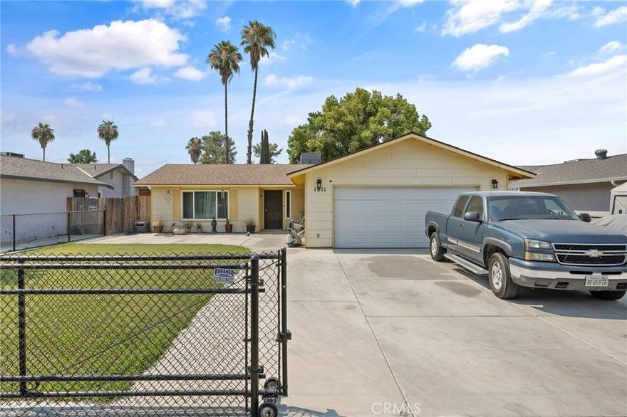 Welcome to this beautifully updated home, thoughtfully renovated with comfort and practicality in mind. Step inside to find fresh, new flooring that adds warmth and character throughout, paired with brand new dual-pane windows that invite in natural light and improve energy efficiency. The kitchen has been fully redone with tasteful finishes, clean lines, and brand new appliances perfect for everyday meals or hosting friends. Each bathroom features updated vanities with a simple, modern touch, creating a clean and welcoming feel. The new AC unit and ductwork offer reliable comfort year-round, while the fully drywalled garage provides a tidy and functional space for storage, hobbies, or a home gym. Outside, a sliding fence adds a smart, pet-friendly solution while also giving the backyard a sense of privacy. With all the major upgrades already done, the new owner will save thousands in future repair and renovation costs making this move in ready home not only stylish and comfortable, but also a smart investment. Whether you're looking for a primary residence or a low-maintenance, income-producing property, this home is a fantastic opportunity.