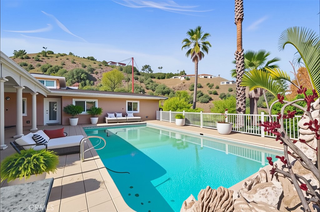 Welcome to 1606 Glenmont Drive, an exceptional property nestled in one of Glendale’s most sought-after neighborhoods. Perched on an elevated lot in the serene hills of North Glendale, this elegant residence offers panoramic city skyline and mountain views that stretch endlessly in every direction.
Step outside to a private, resort-style oasis featuring an expansive pool deck — ideal for sun-drenched lounging, entertaining, or enjoying tranquil evenings under the stars. The oversized pool and surrounding patio space are perfectly positioned to take full advantage of the scenic backdrop, creating a seamless blend of indoor-outdoor California living.
Inside, the home offers a well-balanced layout with bright, spacious rooms designed to maximize natural light and capture the views from nearly every window. Whether you're hosting guests or relaxing in privacy, this home offers the ultimate blend of comfort, style, and sophistication.
Located minutes from downtown Glendale, premier shopping, dining, and award-winning schools, 1606 Glenmont is a rare opportunity to own a view property with both luxury and lifestyle at its core.
