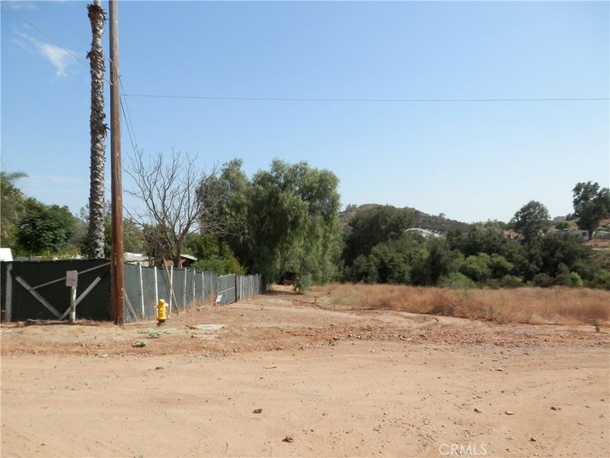 Exciting new listing! 2.74 Acre vacant land in the growing city of Wildomar, in Riverside County. Located north of the 15 Freeway and Budy Canyon Rd., south of Cottonwood canyon Rd. in Mulberry St., Power is nearby the topography varies from flat to gently rolling, offering scenic views and flexible development potential. Short drive to I-15, I-215, and Hwy 74, Proximity to Loma Linda University Medical Center, Mt. San Jacinto College, shopping centers, and schools. Located near Canyon Lake, Menifee, and Lake Elsinore. Whether you’re looking to develop one home or invest in multiple parcels, this is an excellent opportunity in one of Southern California’s fastest-growing regions. Enjoy privacy, convenience, and beautiful surroundings, not quite off the grid, but close to nature. Buyer to verify land use and development potential with the City of Wildomar Planning Department. APN: 361-202-001. Size: +/- 2.74 Acres; Zoning: RR; Terrain: Flat to rolling; GPS: 33.644701, -117.227898 (N.E Corner).