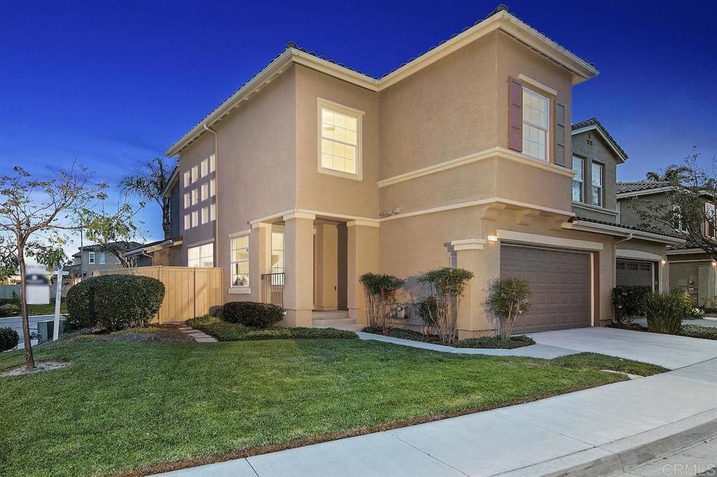 Lives Like a Single-Family Home! Step into this beautifully updated Plan 4 end unit townhome in the desirable gated community of Poinsettia Heights. Bathed in natural light, this spacious home features 4 bedrooms plus an upstairs loft, along with a generous great room, separate living and dining areas, and a dedicated laundry room on the main floor. Large outside patio area off the kitchen ideal for outdoor dining and entertainment. Set on a premium corner lot with no neighbor behind, the home enjoys enhanced privacy and a rare front yard great for everyday living. The reimagined kitchen, remodeled in 2022, shines with quartz countertops, a designer tile backsplash, stainless-steel appliances, and on-trend matte black fixtures. Throughout the home, new wide-plank vinyl flooring and plush carpet in a soft, neutral palette create a warm and welcoming feel. Fresh paint, modern LED lighting, and new ceiling fans add the perfect finishing touches. Bathrooms have also been tastefully updated with quartz counters, sleek sinks, and contemporary fixtures, offering a clean and cohesive design throughout. Poinsettia Heights is a private, gated community with wide streets, manicured greenbelts, and a sparkling pool area, along with direct access from within the community to Aviara Community Park. This home is ideally located just 3 miles from the beach and within the sought-after Carlsbad Unified School District, minutes from Legoland, The Flower Fields, scenic parks, and all the best of Aviara, Carlsbad Village and North County coastal living.