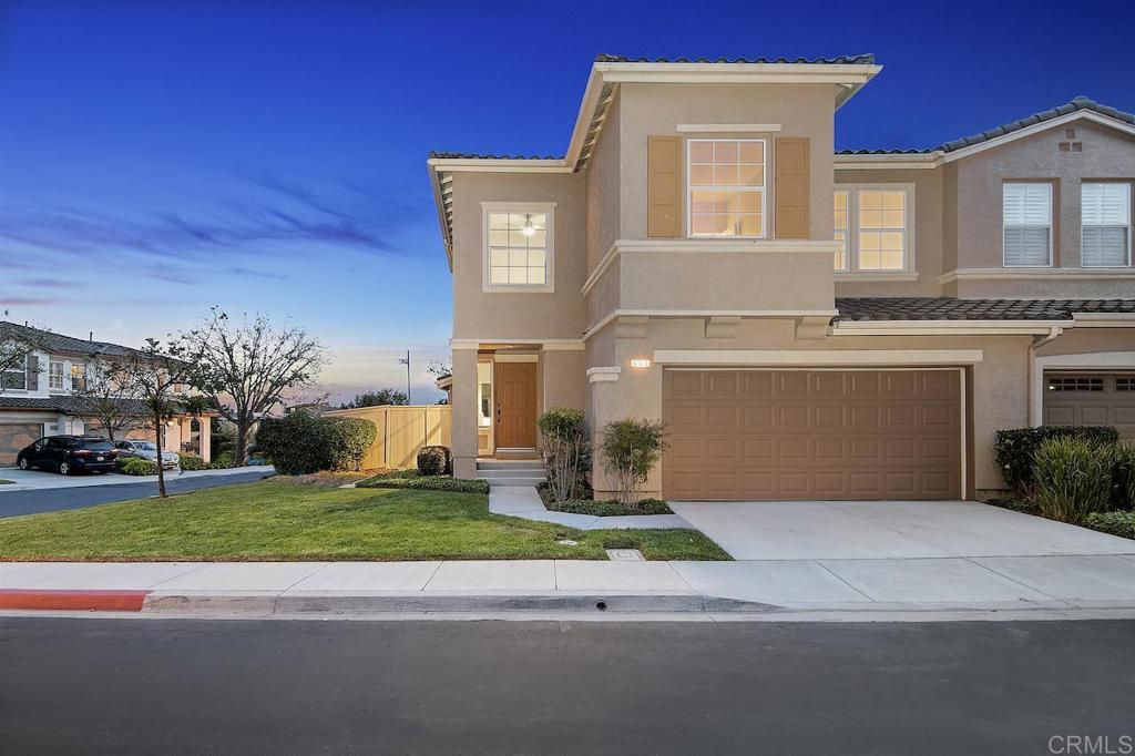 Poinsettia Heights – Lives Like a Single-Family Home Step into this beautifully updated Plan 4 townhome in the desirable gated community of Poinsettia Heights. Bathed in natural light, this spacious home features 4 bedrooms plus an upstairs loft, along with a generous great room, separate living and dining areas, and a dedicated laundry room on the main floor. Large outside patio area off the kitchen ideal for outdoor dining and entertainment. Set on a premium corner lot with no neighbor behind, the home enjoys enhanced privacy and a rare front yard great for everyday living. The reimagined kitchen, remodeled in 2022, shines with quartz countertops, a designer tile backsplash, stainless-steel appliances, and on-trend matte black fixtures. Throughout the home, new wide-plank vinyl flooring and plush carpet in a soft, neutral palette create a warm and welcoming feel. Fresh paint, modern LED lighting, and new ceiling fans add the perfect finishing touches. Bathrooms have also been tastefully updated with quartz counters, sleek sinks, and contemporary fixtures, offering a clean and cohesive design throughout. Poinsettia Heights is a private, gated community with wide streets, manicured greenbelts, and a sparkling pool area, along with direct access from within the community to Aviara Community Park. This home is ideally located just 3 miles from the beach and within the sought-after Carlsbad Unified School District, minutes from Legoland, The Flower Fields, scenic parks, and all the best of Aviara, Carlsbad Village and North County coastal living.