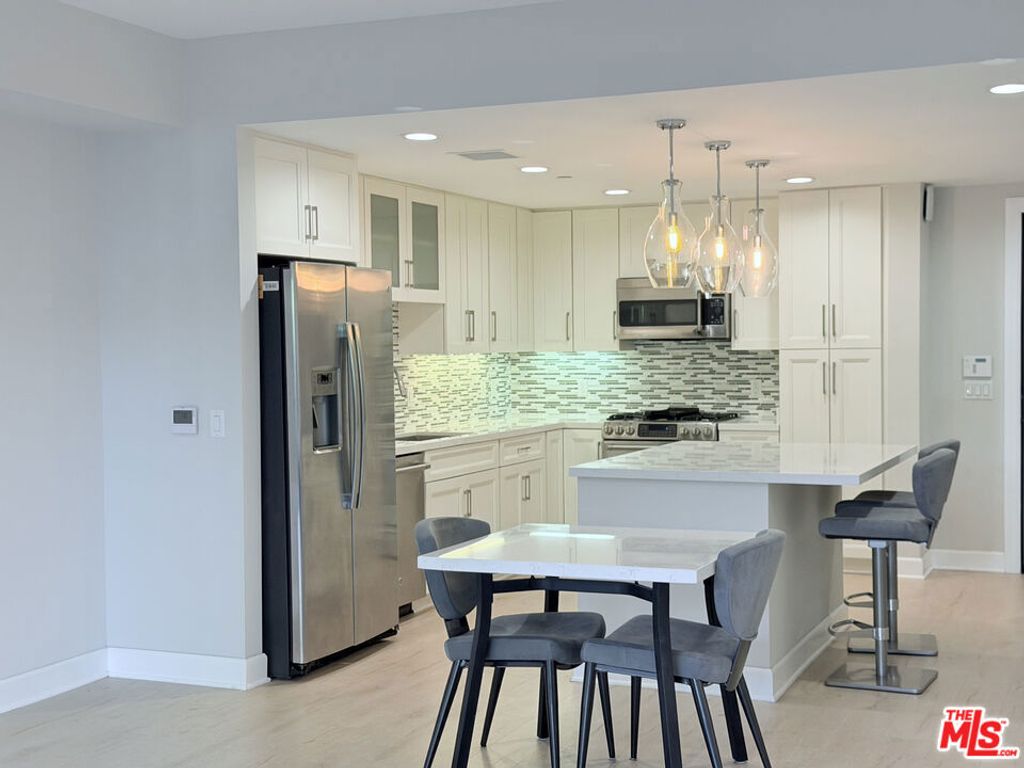 Photo of 5015 Balboa Boulevard #201, Encino, CA 91316 (MLS # 26672025)