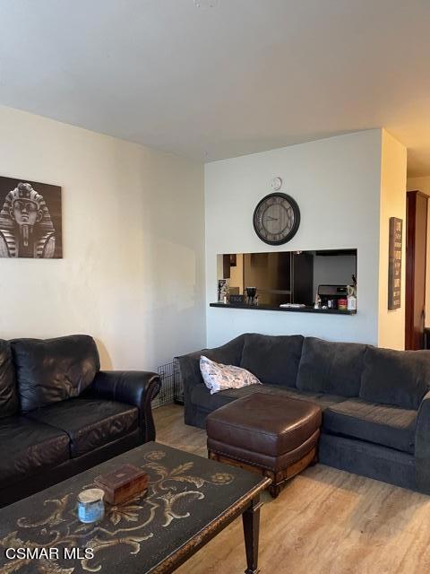 FHA approved!!! 91362 zip code in desired school area. Downstairs unit with enclosed carport. View of inviting pool. Newer cherrywood kitchen cabinets and granite counter tops. Needs appliances, paint, flooring. Current condition is not bad, however needs some love. It wouldn't take much to make this your own unique haven. Spacious gated front patio leads to entry door for added privacy & security. High percentage of homes in this complex are owner occupied.