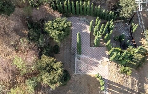 Photo of 7138 Highcliff Trail Trl, Tujunga, CA 91042 (MLS # BB26080790)