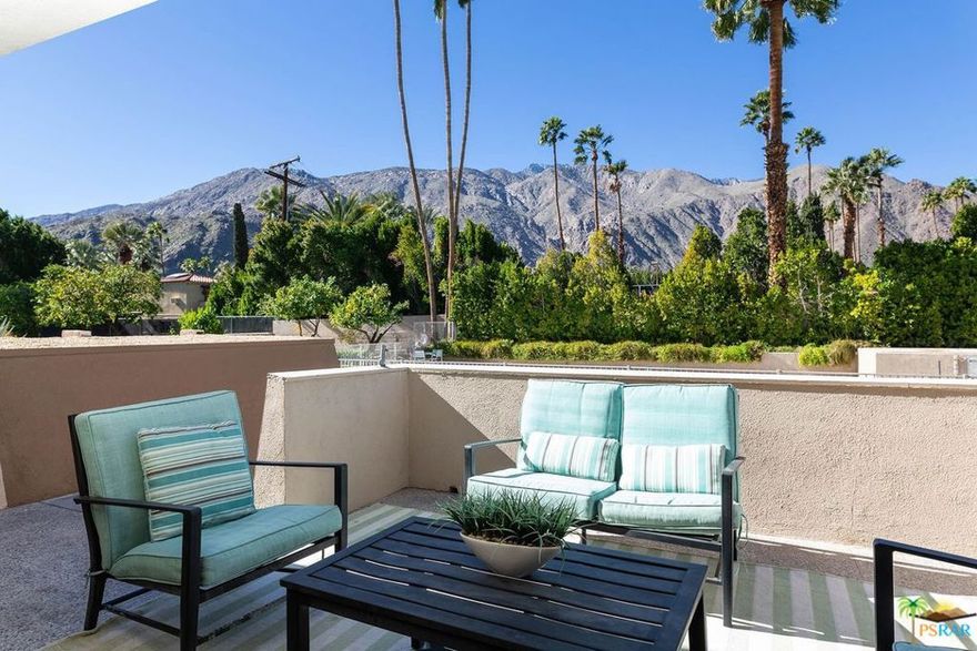 Lovely condo available for rent in a small development. Abundant outdoor space, with views views views. 2 BRs (one currently a den with no closet) 2 Baths. The Living Room is bright and very large with a dry bar and dining area. The kitchen has plenty of storage and has room for a table and chairs if desired. The Master has a wall of closets and an east facing balcony. This small development of 24 units is downtown Palm Springs and has a heated pool, spa, one car secured underground parking and a small storage room. Some original details are still found in the home. All appliances are included, including a stacked W/D in unit. Furnishings not included, prospective renters to verify all information.