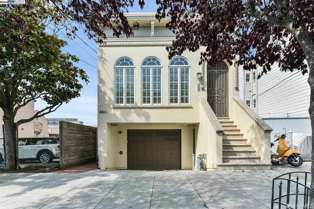 Set on a coveted front lot on 6th Avenue, this reimagined single-family home blends timeless design with modern comfort in one of San Francisco's most desirable neighborhoods. Reconstructed in 2010, the 3-bedroom, 3-bath layout is airy and elegant, featuring hardwood floors, two fireplaces, and abundant natural light from skylights and recessed lighting. The open-concept main level centers around a chef's kitchen with a granite-topped island, custom cabinetry, and high-end stainless steel appliancesideal for daily living and entertaining. Upstairs, the luxurious primary suite includes a private balcony, dual vanities, and a spa-like soaking tub. Bathrooms feature designer stone tile and premium fixtures. Step outside to a serene rear courtyard framed by a flowering treeperfect for al fresco dining or morning coffee. An oversized 4-car garage offers exceptional storagean uncommon luxury in the city. Just blocks from Clement Street, the Presidio, and Golden Gate Park, this home offers walkable access to top cafes, shops, and green spaces. Refined, spacious, and ideally located, this is city living at its finest. Available individually or with 373 6th Ave. Together, they offer approximately 4,000 sq ft of living space and can also be rented together for $18,000/month.