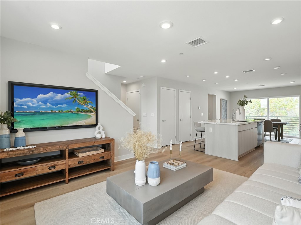 Welcome to Mira Vista by Toll Brothers, a new community located in San Diego which is close to world class beaches, Mission Bay Park, exponential shopping and dining and easy freeway access. Homesite 110 is a new construction home that is primely located in central Clairemont Mesa. The C3 floorplan features 3 bedrooms, with 2.5 bathrooms, and is 1,614 sq. ft, with a 2-car garage. This amazing floorplan offers floor to ceiling window that allows the natural sunlight to shine indoors. Upon entering the home take notice of the downstairs bedroom with full bath great for guests or a home office. The 2nd floor living area features a spacious chef’s kitchen with an expansive center island. The kitchen opens to the spacious entertaining Dining room with large expansive great room. There is a functional covered deck off the great room which combines indoor and outdoor living San Diego is so well known for. The 3rd floor is comprised of a large primary bedroom suite and has a big walk-in closet. The secondary bedrooms are on the opposite end of the home making this home perfect for functionality. Laundry Room is conveniently located on the 3rd floor making your day to day living delightful. Highlights of the home include upgraded whole house Oregon Pine cabinets with chrome pulls, upgraded full slab quartz counters in kitchen with full slab backsplash, upgraded primary shower wall and floor tiling, brand-new full-size Whirlpool stacked washer and dryer, KitchenAid stainless steel appliances, upgraded luxury Provenza New Wave luxury vinyl plank flooring on main living areas and upgraded carpet, tankless water heater, owned solar, electric car charging outlet, additional electrical throughout and interior insulation package are just some of the many included options built into the price of this home. Homesite 110, is ready to close. Photos provided are of the model home.