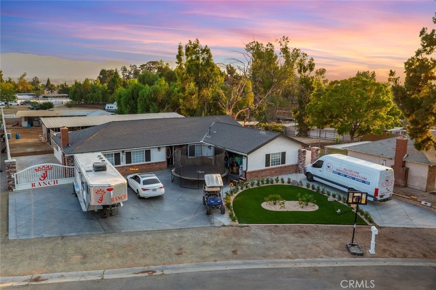 Welcome to your dream ranch retreat! This beautifully upgraded home is thoughtfully designed with a Feng Shui north-facing entrance and offers the perfect blend of convenience and serenity just minutes from the 15 and 91 freeways. Step inside to discover an inviting open-concept floor plan featuring brand-new flooring, custom-built kitchen cabinetry, a chef’s commercial-grade refrigerator, and elegantly remodeled bathrooms that bring both style and comfort to everyday living. The exterior boasts a fresh cat-face stucco finish, expansive concrete driveway, heavy-duty custom gate, and rain gutters delivering lasting quality with undeniable curb appeal. The backyard is a true entertainer’s! Host family and friends around your custom outdoor BBQ kitchen, complete with mini-fridge and additional appliances, while enjoying the expansive backyard that offers room for celebrations, play, and even space for horses, training, or farm animals. With no rear neighbors, you’ll treasure the privacy, open skies, and stunning sunsets.

Modern upgrades include a tankless water heater, alkaline water softener, and a brand-new HVAC system for year-round comfort and peace of mind.