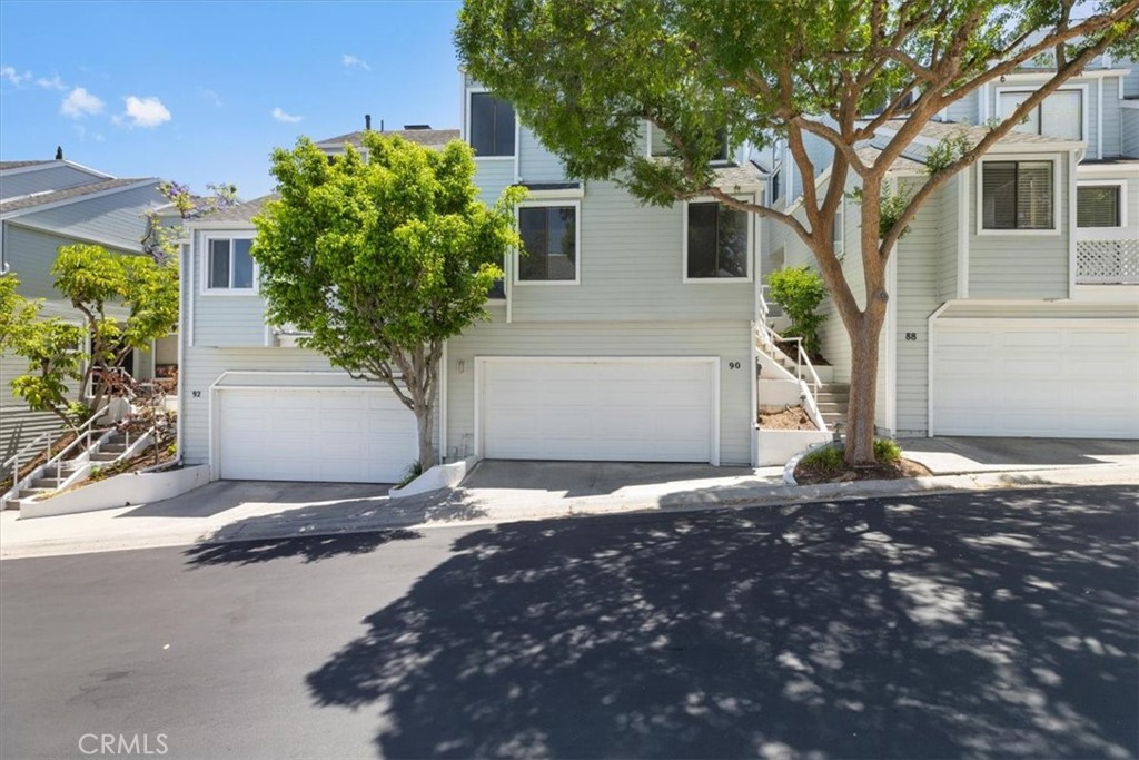Welcome to your next coastal lease opportunity in the exclusive, gated Bay Watch community of San Pedro. This beautifully upgraded multi-level townhome showcases refined finishes, spacious living, and resort-style amenities, all in one of the area's most desirable neighborhoods. Featuring rich dark wood flooring throughout, the home welcomes you with a spacious, light-filled layout ideal for both everyday living and entertaining. The custom designed kitchen is equipped with high end JennAir stainless steel appliances, striking granite countertops, a center island with bar seating, and elegant white cabinetry, all flowing into an open dining area and expansive living room. The main living floor also includes a convenient half bathroom. Upstairs, you'll find three bedrooms and two full bathrooms, including a luxurious primary suite with a private balcony, walk-in closet, soaking tub, and spa-like shower. Additional highlights include central air conditioning, in-unit laundry, and a direct-access two-car garage. Downstairs, a versatile bonus room provides the perfect space for a home office, gym, or media room. The oversized private backyard patio is ideal for outdoor relaxation and connects to the community’s resort-style amenities, including a pool, spa, and beautifully maintained grounds. Ideally located near shopping, dining, and freeway access, this exceptional lease opportunity offers elevated living in one of San Pedro’s most sought-after communities.