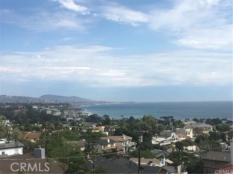One of the best views on the market! 3 ensuite bedrooms, two down and one up. A truly unique contemporary style home with breathtaking views of the Coastline, Catalina, and the Pier. Combining spacious indoor-outdoor living, this stunning residence is the perfect beach property to call home. Centrally located in the prestigious Dana Point Lantern District, just moments to world renowned beaches, shopping and dining, this property encompasses true California coastal living.