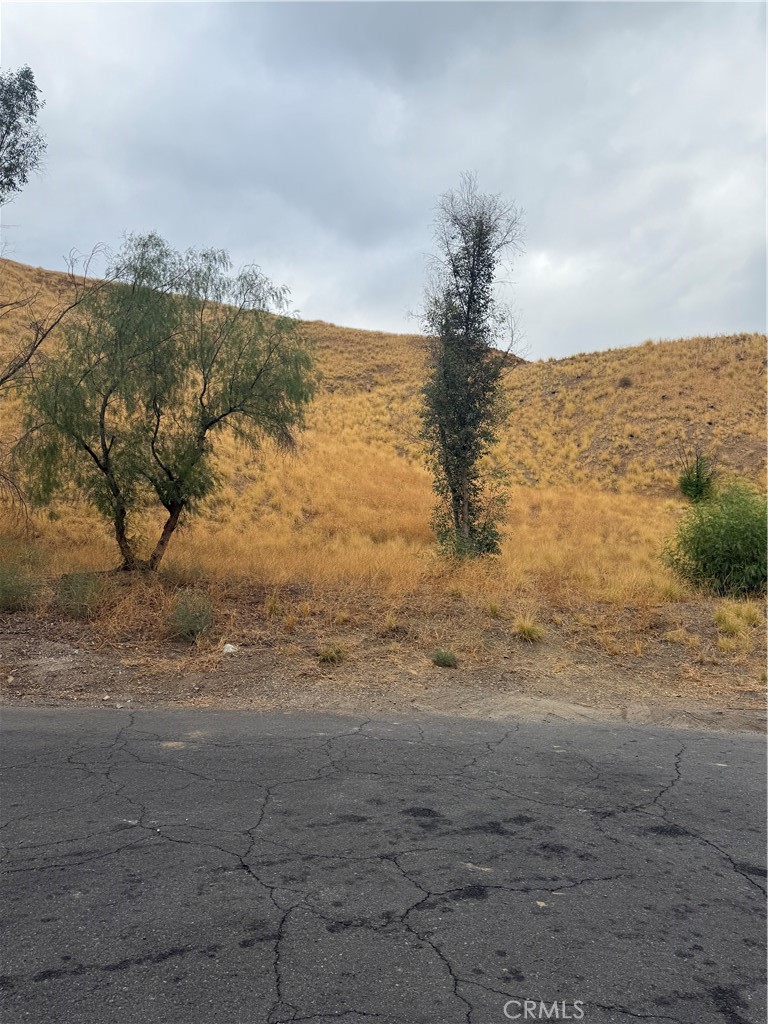 Welcome to 3448 N Beverly Dr – a rare opportunity to own 8.39 acres of prime land tucked away at the end of a peaceful cul-de-sac in one of San Bernardino’s serene neighborhoods. This Multi-Family Residential (R3) zoned lot allows for a maximum of 14 units, making it ideal for both developers and buyers looking to build a dream estate with future investment potential. Current almost city-approved plans feature a modern, open, and minimalist single-family residence of 1,878 sq. ft. The septic and grading plans valued at over $30,000 will come next after city plans are been approved. Final city fees and conditions remain pending, giving the new owner the perfect opportunity to step in and finish the process with ease. From this elevated property, you’ll enjoy tranquil surroundings, panoramic city views, and the privacy of hillside living, all while being just minutes away from schools, shopping, freeways, and the many attractions San Bernardino has to offer,
This is truly a one-of-a-kind chance to build or develop in a prime location with incredible potential. Don’t miss out on making this extraordinary property yours!