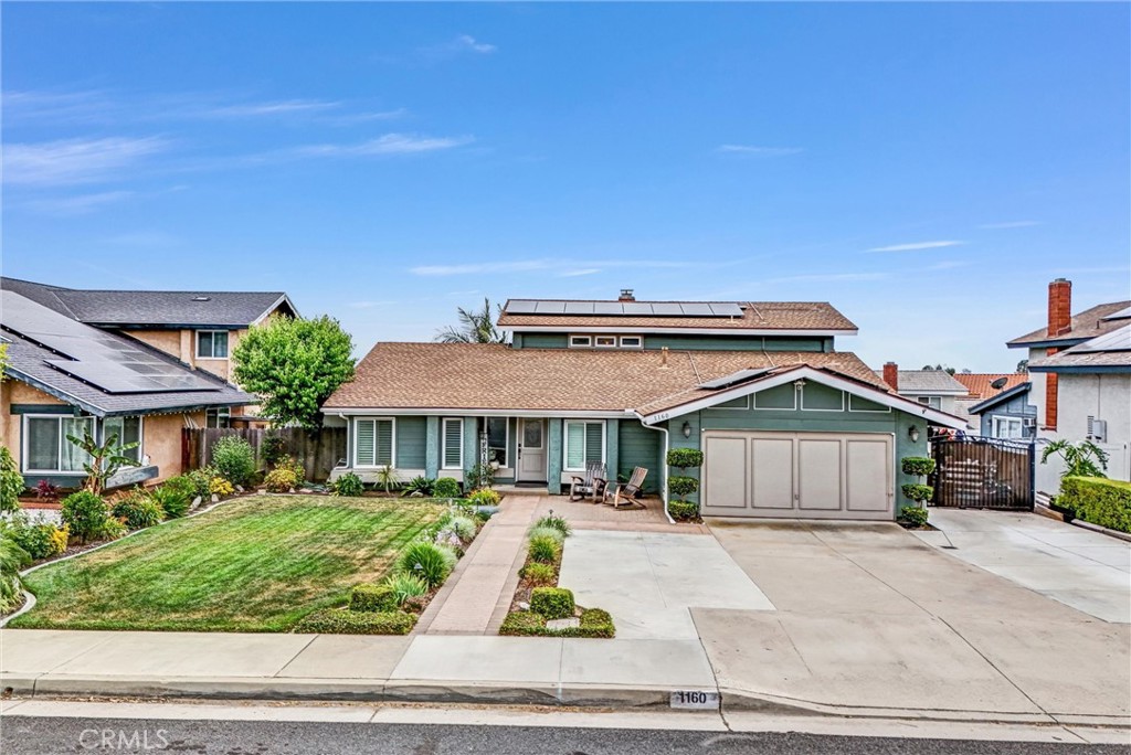 Wow! Completely remodeled, 5 bedroom (w/main floor primary suite), 3 bathroom home, RV Parking. Major house remodel was completed in 2017. Completely renovated kitchen with new cabinets, granite counters, new stainless steel appliances, new flooring throughout the home, upgraded copper pipe plumbing, new electrical box, LED lighting, dual pane windows with shutters. Front and Backyard were also renovated along with landscaping. Covered “Alumawood” patio with lighting and ceiling fans, above ground spa, fire pit, Tuff shed. Too many upgrades to mention, please see supplements for entire list. The main floor features a living room, along with a dining room. Adjacent is the kitchen and family room with a cozy fireplace. Downstairs has your primary suite with private bathroom. All bathrooms were remodeled in 2019. An additional office/bedroom is downstairs along with a guest bathroom. Direct access to the garage. Upstairs are the 3 other bedrooms, hallway bathroom. Perfect backyard for entertaining! Solar to save on your electric bill. Nearby shopping centers, schools, parks and easy access to freeways! Do not miss out!