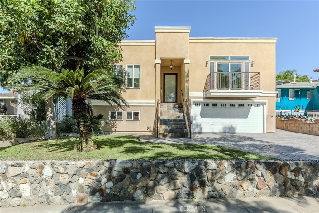 Welcome to 1039 E Santa Anita Ave, a beautifully maintained home located in the highly sought-after Burbank Hills. Built in 2011, this spacious 3-bedroom, 3-bathroom residence offers approximately 1,954 square feet of well-designed living space on a generous 7,500 square foot lot. Upon entering, you'll find an open and inviting layout with abundant natural light. The home features central heating and air conditioning, recessed lighting, and a flexible floorplan ideal for modern living. The living and dining areas flow seamlessly, creating a comfortable space for entertaining or relaxing. The kitchen offers ample cabinetry and counter space, perfect for home cooking or casual gatherings. Each of the three bedrooms is generously sized, and both bathrooms are tastefully updated. The backyard is a private oasis with room for outdoor dining, gardening, or future expansion. A long driveway and attached garage provide plenty of parking and storage options. Located in a peaceful neighborhood near parks, top-rated schools, and popular Burbank shopping and dining spots, this property is a rare find in a prime location. Do not miss your chance to own this exceptional home.