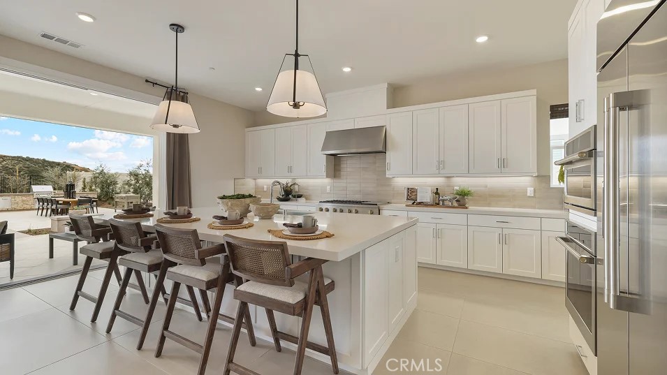 This expansive two-story home offers plenty of space with a total of 4 bedrooms with one of the bedrooms located downstairs with its own private bathroom. The first floor also offers a flex space perfect for an office or gaming room. The rest of the first floor features an open layout from the modern kitchen that offers white cabinetry throughout, massive walk in pantry. The dining and family room opens to a covered California Room ideal for indoor-outdoor living. The second floor hosts a bonus room along with three more bedrooms. The luxe owner's suite is has a walk in closet. Just added upgraded flooring. come by and see.