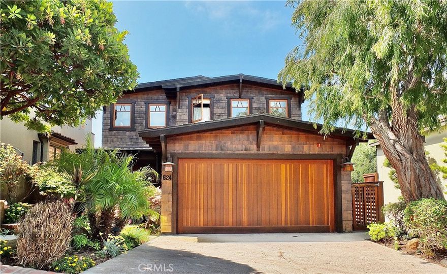 Coastal Craftsman Masterpiece: A Breathtaking Retreat!



Prepare to be captivated by an exquisite blend of luxury and coastal charm in this Coastal Craftsman Masterpiece, expertly designed by Nick Schaar Homes & Building. Nestled in the prestigious Hill section, this residence offers stunning elevations and is ideally situated near the Sand section's greenbelt, pristine beaches, and the vibrant heart of downtown.



As you step inside, you’re welcomed by soaring vaulted ceilings and exquisite finishes that elevate everyday living to new heights. The dining room serves as a striking centerpiece, featuring abundant built-ins that seamlessly combine beauty with functionality.



Culinary enthusiasts will be enchanted by the gourmet kitchen, which is a true chef's paradise. Adorned with stunning stone countertops and Viking and Miele appliances, it also boasts wall-to-wall windows that frame breathtaking panoramic ocean views, creating an inviting space for both cooking and entertaining.



Step outside the dining room to a casual living space, ideal for gatherings or relaxation. Designed to showcase spectacular views, this outdoor oasis includes a cozy stone fireplace and disappearing sliding walls that effortlessly blend indoor and outdoor living.



The luxurious primary suite is a true retreat, featuring a spa-like bathroom with a freestanding bathtub, a striking glass tile shower, and an expansive walk-in closet equipped with an innovative automatic rotating hanger system, along with an additional closet for enhanced convenience.



This remarkable property epitomizes quality craftsmanship and contemporary elegance, making it the perfect sanctuary for those who seek an unparalleled lifestyle of luxury, comfort, and convenience in one of the most desirable locations. Don’t miss the opportunity to call this your coastal home!