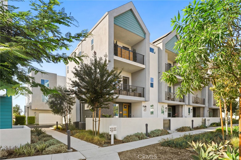 Welcome to 257 Sash, a beautifully upgraded Lennar-built Mulberry corner unit in the heart of Irvine’s Great Park. Positioned on a premium lot with no front-facing neighbors, this residence offers both privacy and convenience—just a short stroll to Solis K-8 and Portola High School. The thoughtfully designed floor plan includes 2 bedrooms, 2.5 baths, a versatile main-level flex space, and two private balconies spanning approximately 1,754 sq. ft. of living space. Highlights include solar panels (leased), luxury vinyl plank flooring on both living levels, upgraded carpet with premium padding, custom window coverings, recessed LED lighting, ceiling fans, and a generously sized laundry closet with washer and dryer included. The chef’s kitchen is appointed with a spacious island, granite countertops with full backsplash, shaker cabinetry, and stainless-steel appliances. Additional upgrades include: whole-home water filtration, water softener, reverse osmosis drinking system in the kitchen, Alexa-compatible smart thermostats, Ring security system with motion/glass break sensors, and an Arlo exterior camera system with solar charging. Residents enjoy the best of Great Park living with access to multiple pools, clubhouses, fitness centers, over 25 tennis courts, basketball courts, parks, BBQ and picnic areas, and more. Conveniently close to Irvine Spectrum, Woodbury Town Center, John Wayne Airport, Kaiser Permanente, and easy access to the I-5, 405, 241, 133 & 73. Zoned for the award-winning Irvine Unified School District.