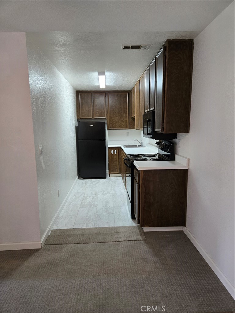 Welcome to the Palm Springs Villas II community, unit L202 very well maintained with beautiful views of the mountains from the living room, private patio and bedroom window. The unit faces west and has an unobstructed view of the Chino Canyon, Mt San Jacinto/Aerial Tramway located in the quiet back end of the park. The laundry room is on the first floor of the building across the way. Nearby dining, shopping, night life entertainment and is close to downtown Palm Springs.