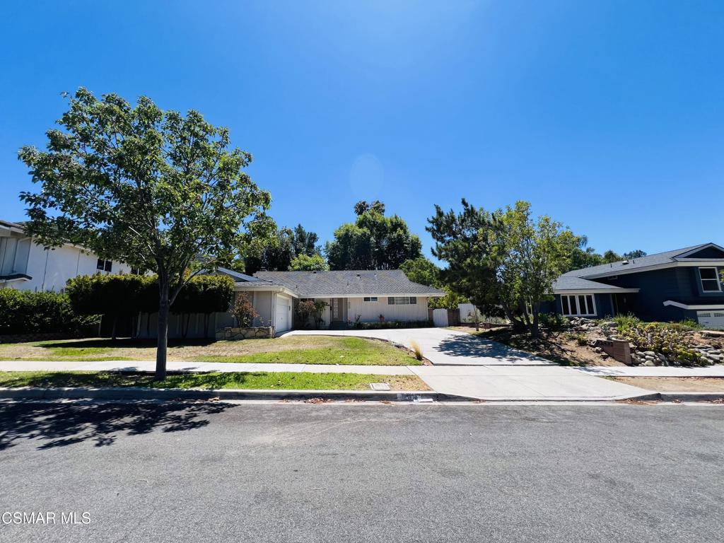 Nestled in a tranquil pocket of Newbury Park, this beautifully remodeled Dutch Haven home is set against the scenic backdrop of the Santa Monica Mountains, where natural mountain breezes create a peaceful retreat.In close proximity down Knollwood Drive brings you to the highly regarded Banyan Elementary School, with Banyan Park and Garden located nearby for outdoor enjoyment. Nature lovers will appreciate being just one block from the Wendy Trailhead, offering direct access to miles of hiking and biking trails that wind through the Santa Monica Mountains all the way to the Pacific Coast Highway.Conveniently located close to everyday essentials--grocery stores, local dining, and entertainment are just a quick drive away, and easy access to the 101 freeway makes commuting a breeze.This single-story, 4-bedroom home features three fully remodeled bathrooms, a kitchen appointed with granite countertops and rich cherry cabinetry, and a versatile bonus/family room with generous built-in storage. Additional highlights include a brand-new A/C system and a spacious backyard filled with mature fruit trees--perfect for relaxing, entertaining, or play.