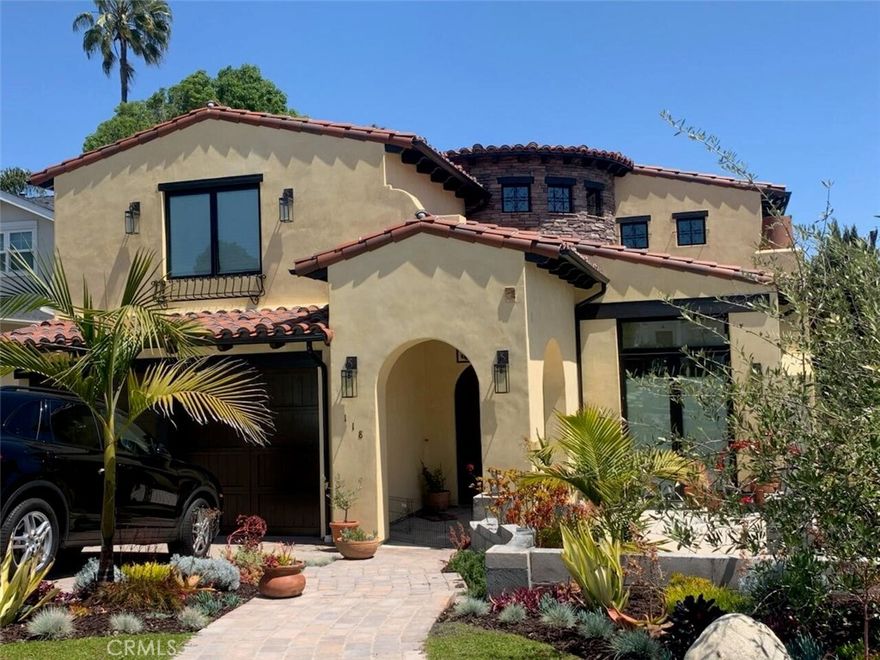 Welcome to this exceptional custom estate in the heart of the Lower Hollywood Riviera, built from the ground up in 2020. Offering 5 bedrooms, 4 bathrooms, and 3,750 sq. ft. of refined living space, this residence blends modern Italian and Montecito-inspired architecture with warmth and elegance.

The chef’s kitchen is a showpiece with Thermador appliances, an oversized quartz island, wine refrigerator, and custom finishes that make entertaining effortless. Dramatic vaulted ceilings, skylights, engineered white oak floors, and architectural curves create a timeless aesthetic. The open-concept design flows seamlessly into inviting living spaces, accented by three fireplaces and a handcrafted Alder wood front door.

Expansive Fleetwood doors lead to a private backyard retreat featuring a covered patio with built-in heaters, surround sound, ceiling fans, Lynx grill, custom brick oven, and gas fire pit with built-in seating. Unwind in the outdoor electric spa or rinse off in the outdoor shower. With low-maintenance turf, fruit trees, and ample space for gatherings, this home is designed for year-round enjoyment.



Additional highlights include a 3-car garage with EV-ready outlets, tank-less water heaters, and a security system. All of this is just a short stroll to the beach, Riviera Village shops, dining, and El Retiro Park. A true Riviera gem that perfectly balances luxury, comfort, and the coastal lifestyle.