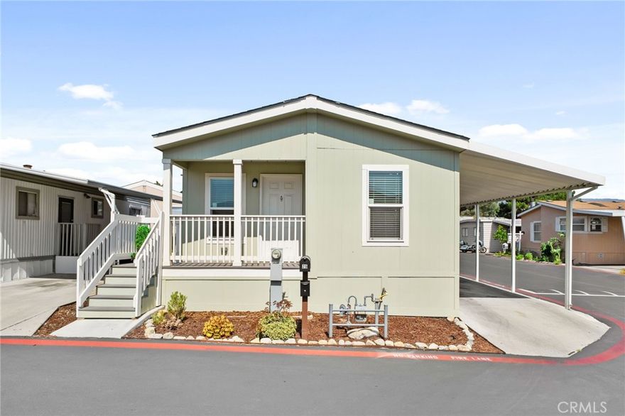 Welcome to this charming manufactured home located in the Sycamore Villas Community, offering comfort, convenience, and community amenities! Being built in 2023, this home features a clean exterior with a covered carport and a welcoming front porch, this home has great curb appeal. Inside, you’ll find a cozy carpeted living room that flows into an open kitchen and dining area, perfect for gatherings. The kitchen is highlighted with granite counters and plenty of cabinet space. With three spacious bedrooms and two full bathrooms, including a primary suite, there’s room for everyone. A dedicated laundry room adds to the functionality of this home.



Located in a vibrant community, you’ll enjoy access to resort-style amenities including a pool, spa, clubhouse, billiards room, gym, and even a basketball court area. This home blends everyday comfort with recreational living—ready for you to move in and make it your own!