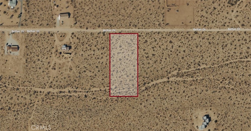 Opportunity awaits on Belfair Drive in the heart of Joshua Tree’s wide-open desert. This expansive parcel offers stunning mountain horizons, endless skies, and the quiet beauty that makes Joshua Tree so captivating. With ample space to design your dream home, vacation retreat, or future investment, this land provides both freedom and possibility. Located just a short drive from Joshua Tree Village and the National Park entrance, you’ll enjoy privacy without being far from dining, shops, and outdoor adventure. A rare chance to shape your own vision in one of California’s most inspiring desert communities.