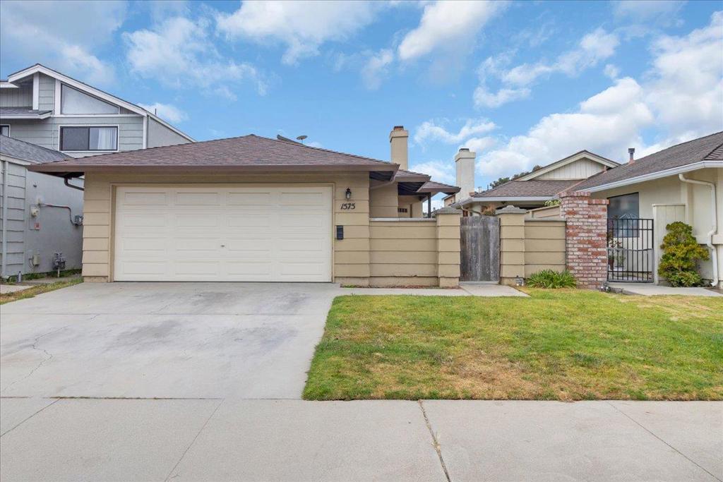 This well maintained 3 bedroom 2 bath home has a wood burning fireplace. A new roof was installed on 2017, the garage door was installed 3 years ago, and the gutters were installed September 2024. There is a gated front patio as you enter the home for increased privacy. Lots of sunlight from the extra large sliding glass door in the family room. Vaulted ceilings give a much more "airy" and spacious feel. The garage ha a storage room inside the garage. Located in North Salinas, near schools, shopping, a park, and has easy access to Hwy 101.