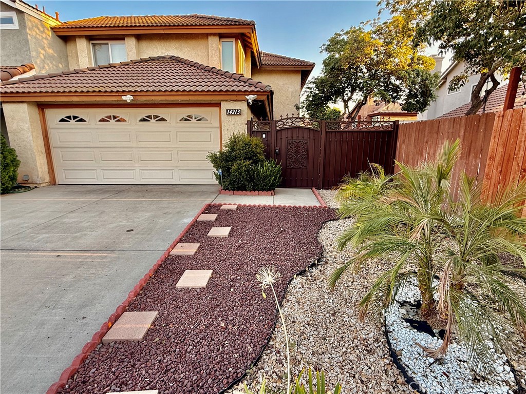 LOCATION, LOCATION, LOCATION! Very well maintained two story, 4 bedrooms, three full bathroom and a half. Nice curb appeal, spacious courtyard to enjoy a cup of coffee or just to relax in the evening with wrought iron gate for privacy. Living room with fireplace, very clean kitchen with maple cabinets. Laminate throughout the down and upstairs hallway. Brand new carpet in the upstairs bedrooms. Easy freeway access for the commuter.
