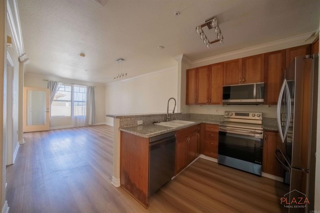 Welcome to Pacific Terrace Unit 612, a meticulously updated and pet-friendly 1 bed/1 bath unit offering 623 sq ft of stylish living space. Located on the building’s top floor, this residence boasts an inviting open-concept layout with newly painted interiors, new Stainless Steel appliances, and hardwood-style flooring that flows seamlessly from the living area to the kitchen. Nestled in the heart of San Diego’s Marina District, you’re just steps from the vibrant Gaslamp Quarter, Convention Center, Petco Park, and a host of dining and entertainment options. Despite downtown’s dynamic atmosphere, this boutique 57-unit building delivers an intimate and serene living experience. Pet lovers rejoice—cats and dogs of all sizes are welcome.
