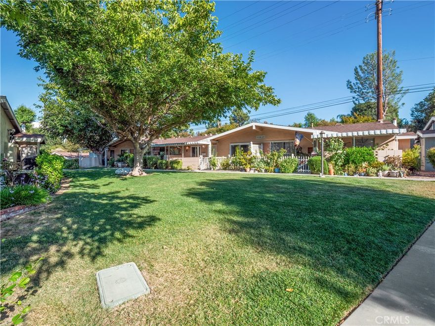 Welcome to your serene retreat in the desirable guard-gated 55+ community of Friendly Valley! This charming home offers a light-filled interior with vaulted ceilings, upgraded flooring, and 2 spacious bedrooms. The bathroom has been tastefully remodeled and features a walk-in shower for added comfort and convenience. Friendly Valley is a vibrant community with incredible amenities including an 18-hole pitch & putt golf course, swimming pool and spa, auditorium, clubhouse, library, fitness center, game room, woodworking shop, ceramics studio, poker room, shuffleboard courts, horseshoe and basketball courts, lawn bowling, picnic areas, and BBQs. HOA dues cover water, trash, hot water, sewer, roof and building maintenance, landscaping, basic cable, insurance, and 24/7 gated security—making for worry-free living. Ideally located near Costco, CVS, Starbucks, Stater Bros, dining, shopping, and easy freeway access. Don’t miss this opportunity to call Friendly Valley your next home!