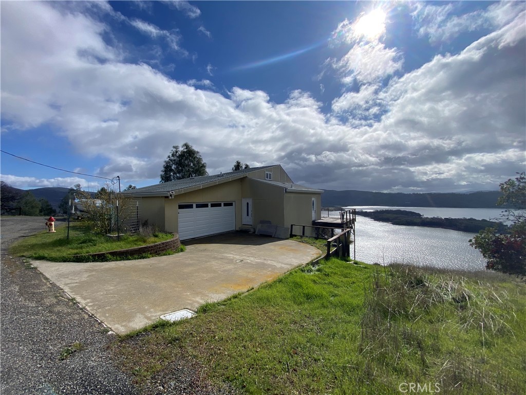 STUNNING PANORAMIC VIEWS OF CLEAR LAKE + BRAND NEW EVERYTHING. Welcome to your COMPLETELY RENOVATED home with breath-taking views over Clear Lake, Rattlesnake Island and Mt Konocti. Located in a private and quiet cul de sac location above it all this home has new concrete board siding all round, recent roof, and new double pane Pella windows, as well as an entirely new interior rebuilt from the studs. The two car garage provides plenty of space for storage and projects. Ample sun for solar development. Two levels, with large bedroom on the lower level and sleeping loft off great room on main level. Seller willing to consider 3% in buyers concessions at closing.