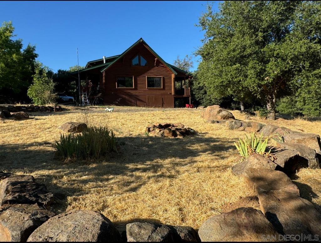 Great cabin style property located on a 3.75 acre land with lots of potential. Property is located on a gated community. You can really feel the nature noise on this property. Property has a detached room that can be used as an office No SDGE service available.