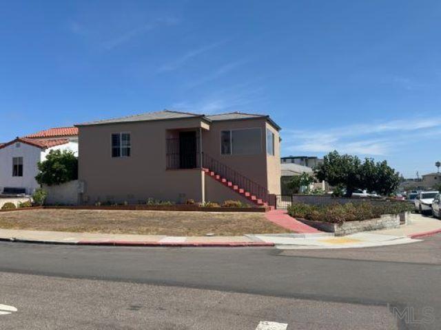 Remodeled 4br/2ba home w/single car garage, large corner lot. Two levels: main level has 3br/1ba, spacious kitchen, large family room, formal dining room, gas stove, refrigerator, bay window. Stacked washer/dryer, large hallway w/plenty or storage cabinets. Lower level contains large bedroom, spacious family room, full kitchen w/gas stove, refrigerator & dining area. Full bath & AC, stacked washer/dryer. Lower unit has it's own separate entry...great for extended families, guest house. Great location in Point Loma Village, close to Liberty Station, retail, grocery, restaurants & a couple blocks to San Diego Sports Fishing Marina & docks!