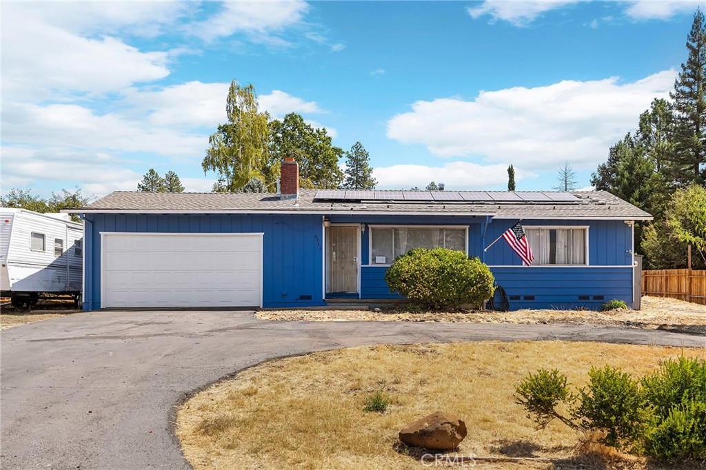 6342 Baston Lane in Paradise is a 2-bedroom, 1-bathroom home offering approximately 948 sq. ft. of living space on a 0.32-acre lot. Built in 1965, this traditional ranch style home has been updated with new vinyl plank flooring, fresh interior paint, and a remodeled kitchen featuring new cabinetry, quartz countertops, and a gas-range. The bathroom has also been updated with modern fixtures. Additional features include a two-car attached garage with laundry hookups, and RV parking. The septic system was replaced in 2018, and the property is served by public water. Outside, a new composite deck overlooks a private yard with mature sycamore trees. Located on a quiet dead-end street, the property is within walking distance to Bille Park and nearby canyon rim trails.