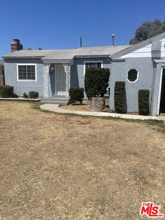 This inviting home offers exceptional value and flexible living space in a well-established neighborhood. Officially recorded as a 2-bedroom, 3-bath property, the home features an additional third bedroom and bathroom ideal for guests, extended family, or a home office setup. Inside, you'll find a functional layout with a comfortable living area, a bright kitchen, and three bathrooms, providing convenience and privacy for everyone. The extra room adds versatility and space that's hard to find at this price point. Step outside to enjoy a generously sized backyard with a covered patio, perfect for entertaining, relaxing, or creating your own garden oasis. Whether you're a first-time buyer, investor, or looking for more room to grow, this home is full of potential. Buyer to verify all permits and square footage to their satisfaction. Don't miss this opportunity schedule your private tour today!