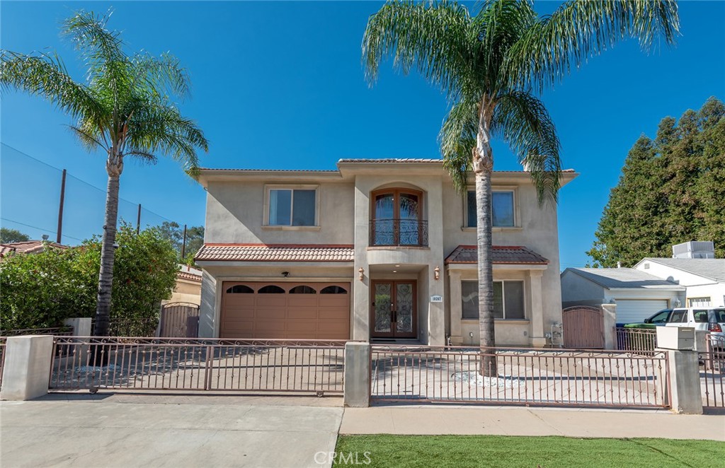 This stunning Mediterranean-style, South of Blvd residence features five bedrooms and four bathrooms across 3,641 square feet full of natural light throughout. Upon entering, the open floor plan seamlessly connects the living room, family room, dining room and a chef's dream kitchen equipped with top-of-the-line Viking appliances. Upstairs the expansive primary bedroom features two walk-in closets and an en suite bath. Additional highlights include spacious guest bedrooms including a first floor bedroom and full bathroom, plenty of storage throughout, recessed lights, wood and tile flooring, a large laundry room and an attached direct entry 2-car garage. The backyard boasts a sparkling pool and spa, perfect for relaxation or entertaining guests. Conveniently situated near prestigious schools, renowned restaurants, shopping centers and high end markets such as Gelsons, El Caballero Country Club, houses of worship, Ventura Blvd, and the 101 freeway, making commuting a breeze.