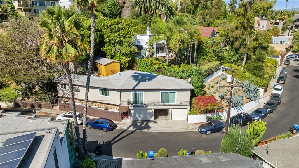Charming Triplex in the Heart of Silver Lake – Perfect for Owner-Occupants & Seasoned Investors
Welcome to this beautifully maintained triplex located in the highly desirable Silver Lake neighborhood! Offering a unique investment opportunity, this property includes two spacious 2-bedroom, 1-bath units and one 1-bedroom, 1-bath unit. With a combined living space of over 4,000 sqft, this triplex is ideal for either an owner-occupant seeking rental income or a seasoned investor looking for an income-generating property in one of LA's hottest areas.
Key Features:
Unit 3434 (2-bed/1-bath) – Approx. 1,800 sqft
Unit 3432 (2-bed/1-bath) – Approx. 1,500 sqft, $120k in upgrades, including new windows
Unit 3430 (1-bed/1-bath) – Approx. 700 sqft
The roof is 8 years old, Cooper plumbing is 6 years old, and the electrical system was updated 4 years ago
Both 2-bedroom units will be delivered vacant at closing; the 1-bedroom tenant is willing to vacate with cash for keys
Units are individually metered and mastered.
Beautiful views of the surrounding neighborhood
With recent upgrades like brand-new windows in both 2-bedroom units and a range of modern improvements throughout, this triplex offers the perfect blend of value, convenience, and potential. Enjoy the vibrant Silver Lake lifestyle, with its trendy shops, restaurants, and parks, while taking advantage of the long-term rental potential.
Whether you're looking to live in one unit and rent out the others or build your investment portfolio, this property is priced to sell and won't last long. Don't miss your chance to own in this sought-after community!