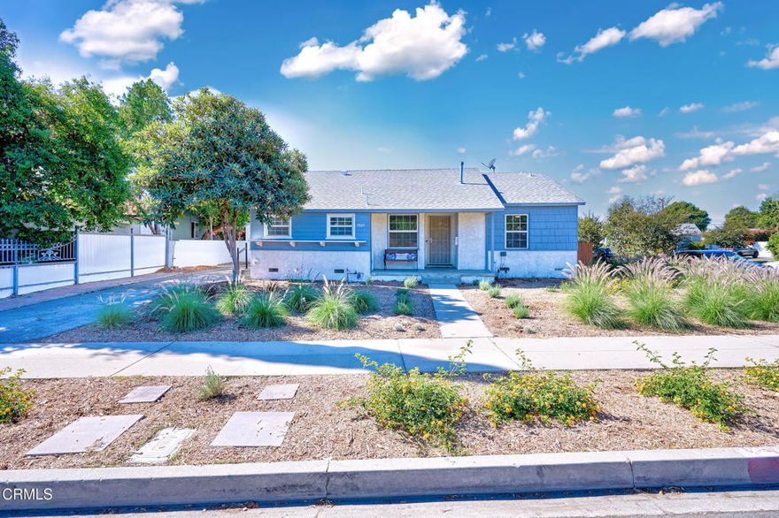 Charming 3 bedroom 2 bathroom Home on Corner with Large Lot and Inviting Front Porch.This charming, light-filled home has thoughtful updates throughout while maintaining is special character and appeal. Inside, you'll find new baseboards, fresh moldings around every window and door and new freshly painted interior. The exterior was painted a few years ago and a brand new AC and ducting and heating system was installed to provide year-round comfort.The kitchen offers newly painted cabinets  with new updated hardware, new light fixtures and a cozy eat-in breakfast nook as well as new waterproof wood-like laminate flooring complemented by engineered wood-like laminate flooring through the rest of the home. Each bedroom includes a ceiling fan with a light for comfort and style. Both bathrooms have been updated with new tile floors; the front bathroom features a tiled shower while the back bathroom includes a newer vanity and sink. There is also an indoor laundry room for added convenience. Outside, the front yard is newly landscaped and features a new drip irrigation system on automatic timer making upkeep easy. The backyard features a covered concrete patio nice for entertaining and relaxing. This home also includes a detached 2-car garage.This bright and inviting well-cared for home is waiting for the perfect buyer!