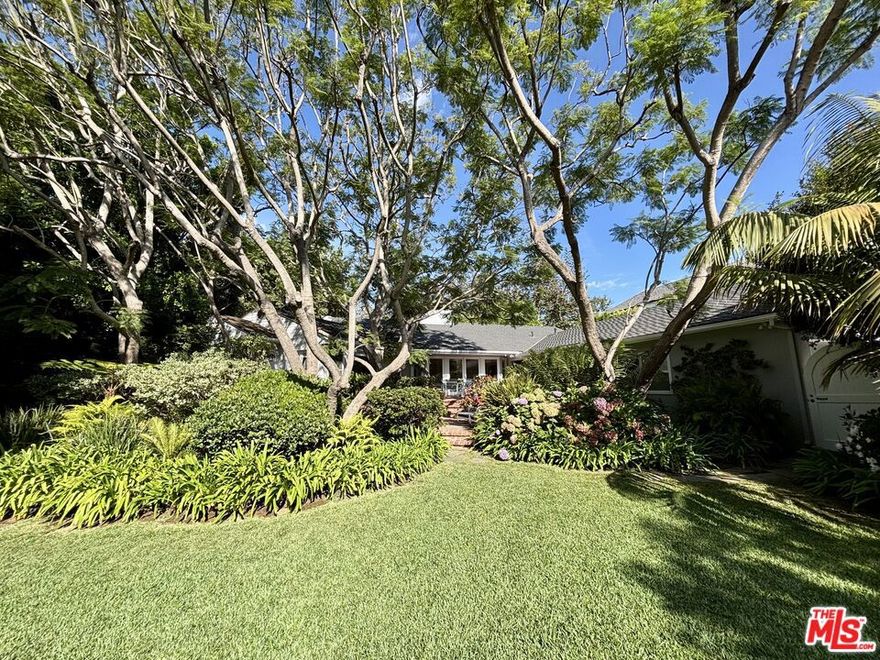 Welcome to 1146 Amalfi Drive in Pacific Palisades. This pristine single story, traditional built in 1948 has not only been thoughtfully renovated during our client's tenure, all Palisades Fire remediation has been completed as well. Situated on a gracious, approximate 18,000 sq. ft. lot North of Sunset, punctuated by mature Sycamores & Jacarandas and privatized with tall Eugenia bushes for complete rear yard privacy, the grounds offer manicured and expansive lawns and bountiful hydrangeas and colorful foliage. The residence offers 4 bedrooms and 4 en-suite elegant baths, 3 with marble vanities, showers and tubs. The Living and Family rooms are adorned by fireplaces w/ gas starters. The home offers a Formal Dining Room, Powder Room and Gourmet Kitchen with marble countertops, Pantry and breakfast area. Hardwood Floors, classic, crown moldings and elegant window treatments throughout most of the house enhance the warmth of the living spaces. Complementing the offering is a 3 car attached garage which could become living space for the house or an ADU with access to the house and to the outside to accommodate renters. For the most discerning of tastes and style, this quintessential offering defines the meaning of graciousness and classic architecture.
