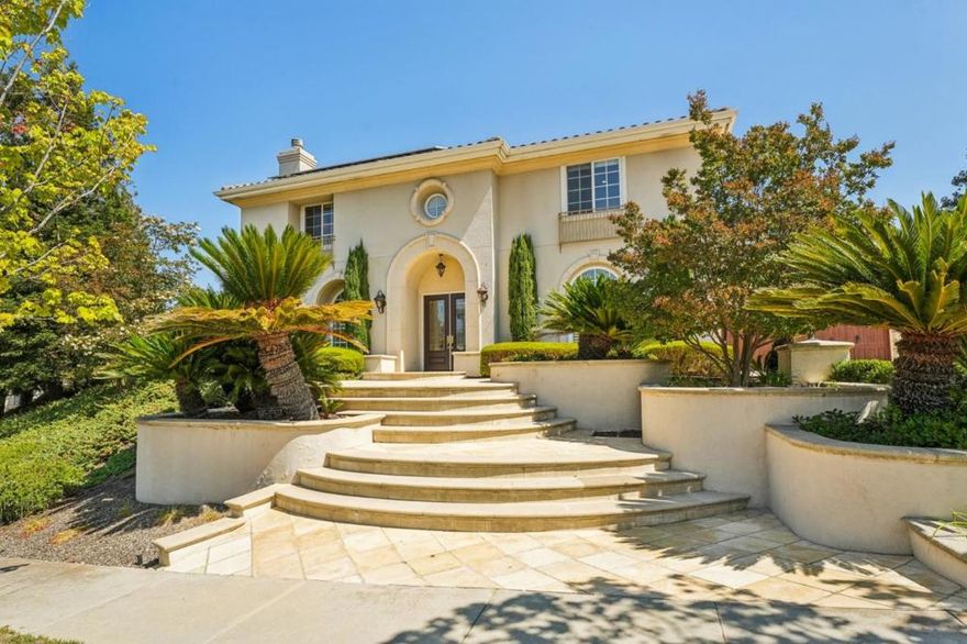 A Masterpiece of Prestige & Panoramic Views  The Mansions Collection Crown Jewel. Beyond the gates of Silver Creek Valley Country Club, this estate marries architectural scale with resort-caliber amenities. The largest Mansions floor plan w/ 6 bedrooms + bonus room & 4.5 baths on an expansive 17,424 sq. ft. private view lot. Elevated interiors feature new designer paint, premium hardwood & new plush carpet upstairs. A showcase chefs kitchen commands center stage w/ an oversized double-bullnose island, custom inset cabinetry, Viking range w/ pot filler & bespoke hood, Sub-Zero refrigerators (2nd one in garage), two more Sub-Zero wine refrigerators, & 2 split Fisher & Paykel dishwashers. The primary suite is a sanctuary w/ a spa bath (soaking tub, walk-in shower), a spacious walk-in closet w/center console & sitting area, & a private balcony framing sweeping foothill vistas. Resort style backyard where no detail has been overlooked & no expense spared. An infinity-edge pool & spa that visually blends into dramatic Mt. Diablo & golf-course views, complemented by a full outdoor kitchen/BBQ, Arcadia motorized pergola, Bromic smart heaters, a covered TV patio, a putting green & additional sitting area with space for an ADU. Additional distinctions include paid-off solar & 4-car garage