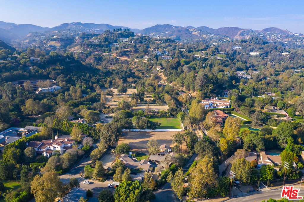 Incredibly rare opportunity to own your own private oasis in storied Sullivan Canyon. Tucked away behind Sunset Boulevard, and just a few miles from the Brentwood Country Mart and shops and restaurants of San Vicente Blvd, this hidden canyon community feels worlds away from the hustle and bustle of the city. A remarkable flat lot that is ideal for building a private estate amongst mature trees and prime California foliage. The property is zoned for equestrian use and is just steps away from the Sullivan Canyon Preservation riding facility. A natural setting that is peaceful and rejuvenating, and with easy access to every convenience. A must see for the most refined buyer looking to build their luxury lifestyle in the heart of Brentwood.